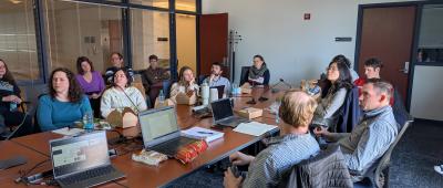 Attendees listen and take notes during Dr. Gritton's presentation at the March 24 Lunchtime Lab